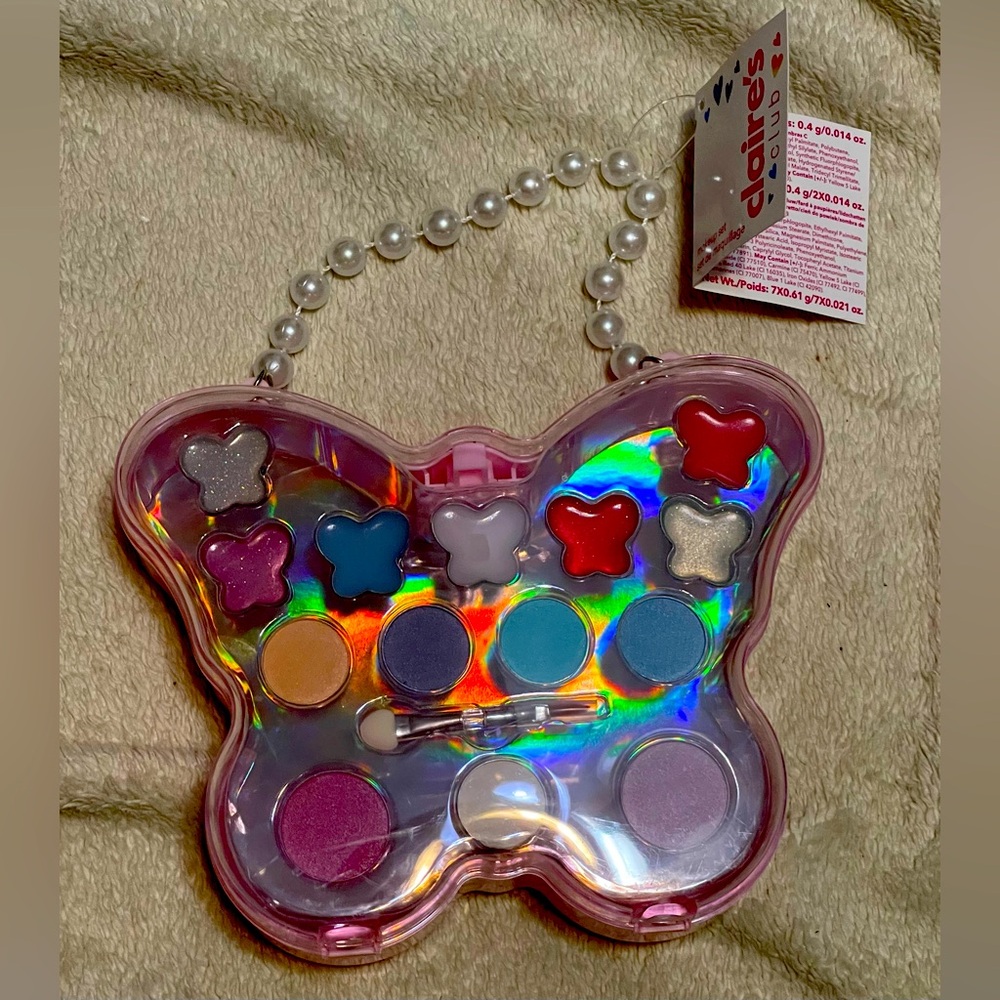 Claire’s butterfly purse 5x5